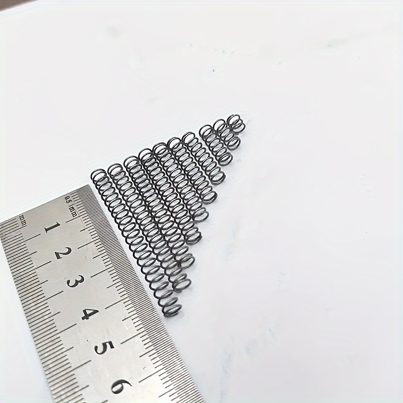10 vnt. 0,6 mm skersmens suspaudimo spyruokliės